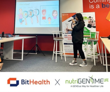 Man pinning images on wall